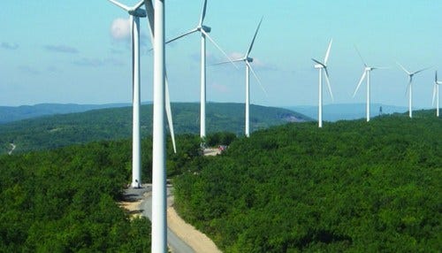 Merger With Indy Wind Farm Developer Complete