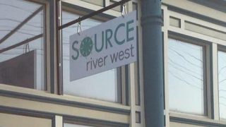 SOURCE River West Sign