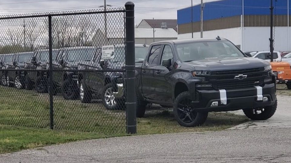 GM Staging Unfinished Trucks for Completion